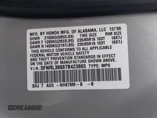 2007 Honda Odyssey EX-L with VIN 5FNRL38687B423865, listed as a IAAI auction lot 42190749 with 215,664 mi miles and . Bid and sale history available at DreamBid. Image 9.