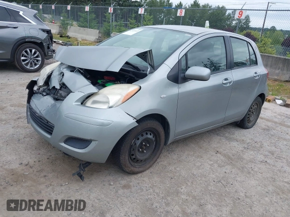 2010 Toyota Yaris z VIN JTDKT4K36A5290179, wystawiony jako IAAI lot #42515432 z przebiegiem 101 224 mil mil oraz . Historia ofert i sprzedaży dostępna na DreamBid. Obrazek 2.