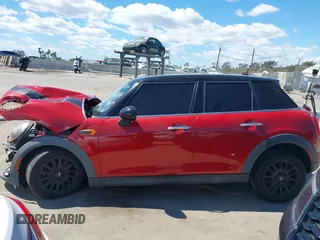 2017 MINI Hardtop 4 Door Cooper z VIN WMWXU1C57H2E18670, wystawiony jako IAAI lot #41950314 z przebiegiem 94 199 mil mil oraz . Historia ofert i sprzedaży dostępna na DreamBid. Obrazek 15.