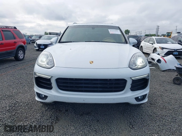 2016 Porsche Cayenne S E-Hybrid z VIN WP1AE2A22GLA17486, wystawiony jako IAAI lot #42229641 z przebiegiem 91 642 mil mil oraz . Historia ofert i sprzedaży dostępna na DreamBid. Obrazek 13.
