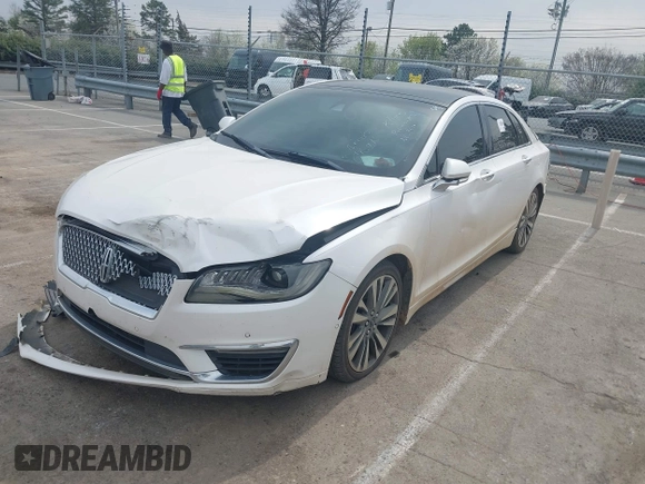 2017 Lincoln MKZ Reserve z VIN 3LN6L5EC2HR613827, wystawiony jako IAAI lot #41800613 z przebiegiem 199 097 mil mil oraz . Historia ofert i sprzedaży dostępna na DreamBid. Obrazek 17.