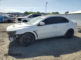 2011 Mitsubishi Lancer Evolution MR z VIN JA32W5FV9BU037534, wystawiony jako Copart lot #56357825 z przebiegiem 135 462 mil mil oraz Tytuł czysty. Historia ofert i sprzedaży dostępna na DreamBid. Obrazek 1.