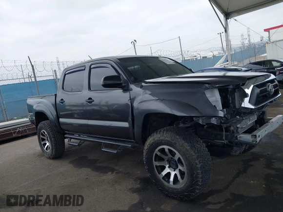 2015 Toyota Tacoma with VIN 3TMLU4EN8FM167337, listed as a IAAI auction lot 42117662 with 60,929 mi miles. Bid and sale history available at carsss.com. Image 13.