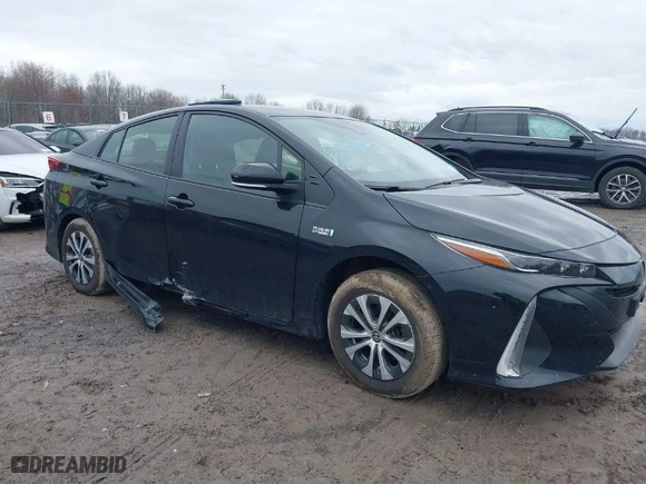 2021 Toyota Prius Prime LE with VIN JTDKAMFP2M3165859, listed as a IAAI auction lot 41943098 with 20,306 mi miles. Bid and sale history available at carsss.com. Image 1.