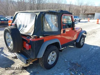2006 Jeep Wrangler SE with VIN 1J4FA29S16P712101, listed as a IAAI auction lot 41347042 with 129,063 mi miles. Bid and sale history available at carsss.com. Image 4.