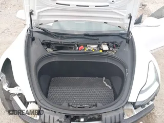 2019 Tesla Model 3 Mid Range with VIN 5YJ3E1EA8KF472540, listed as a IAAI auction lot 41661312 with 75,575 mi miles and . Bid and sale history available at DreamBid. Image 10.
