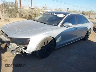2011 Audi A8 z VIN WAURVAFD4BN020585, wystawiony jako IAAI lot #41841459 z przebiegiem 110 536 mil mil oraz . Historia ofert i sprzedaży dostępna na DreamBid. Obrazek 2.