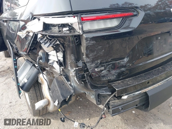 2022 Jeep Grand Cherokee Limited with VIN 1C4RJJBG8N8521335, listed as a IAAI auction lot 41010211 with 45,047 mi miles and . Bid and sale history available at DreamBid. Image 12.