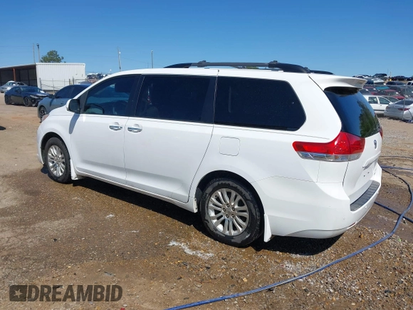 2014 Toyota Sienna XLE z VIN 5TDYK3DC7ES431782, wystawiony jako IAAI lot #41975182 z przebiegiem 191 870 mil mil oraz . Historia ofert i sprzedaży dostępna na DreamBid. Obrazek 3.