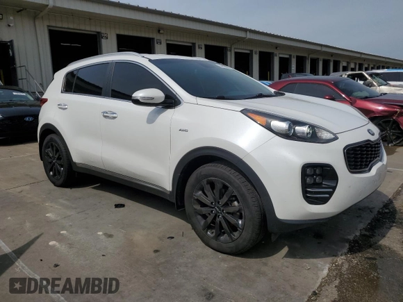 2019 Kia Sportage EX z VIN KNDPNCAC7K7522953, wystawiony jako Copart lot #54906835 z przebiegiem 128 011 mil mil oraz Szkoda całkowita • Salvage title. Historia ofert i sprzedaży dostępna na DreamBid. Obrazek 4.
