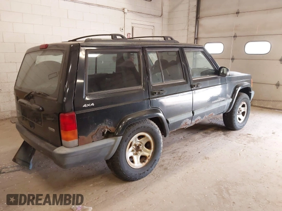 1999 Jeep Cherokee Sport z VIN 1J4FF68S4XL668081, wystawiony jako IAAI lot #42304649 z przebiegiem 194 470 mil mil oraz . Historia ofert i sprzedaży dostępna na DreamBid. Obrazek 4.