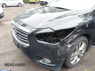 2015 Infiniti QX60 with VIN 5N1AL0MM7FC528002, listed as a IAAI auction lot 42260916 with 228,379 mi miles and . Bid and sale history available at DreamBid. Image 6.