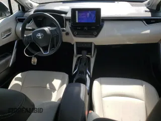 2023 Toyota Corolla Cross XLE with VIN 7MUDAAAG5PV068355, listed as a Copart auction lot 58121795 with 25,667 mi miles and Salvage title. Bid and sale history available at DreamBid. Image 8.