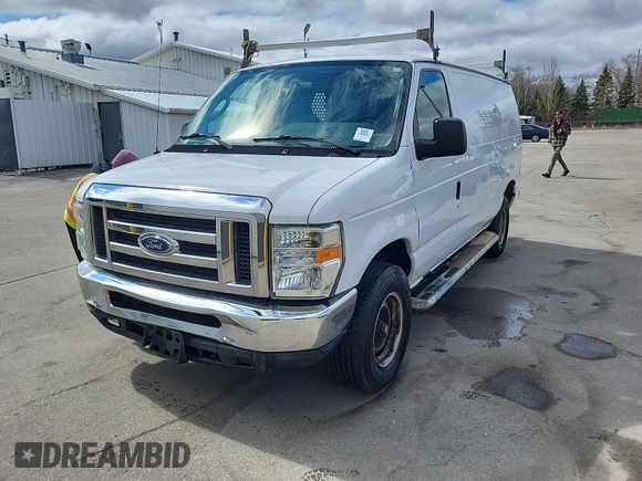 2011 Ford Econoline Cargo Commercial with VIN 1FTNE2EW0BDA77060, listed as a IAAI auction lot 42195616 with 173,512 mi miles. Bid and sale history available at carsss.com. Image 28.