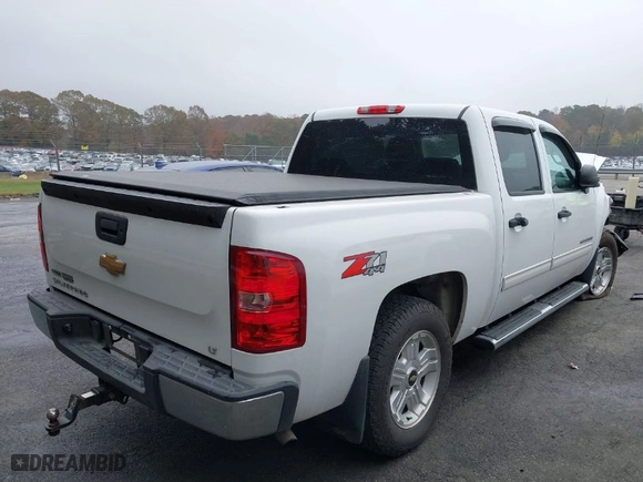 2012 Chevrolet Silverado 1500 LT with VIN 3GCPKSE72CG109571, listed as a IAAI auction lot 40809226 with 124,270 mi miles. Bid and sale history available at carsss.com. Image 4.