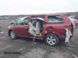 2014 Toyota Sienna L with VIN 5TDZK3DC8ES477402, listed as a IAAI auction lot 41494073 with 102,063 mi miles. Bid and sale history available at carsss.com. Image 14.