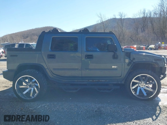 2005 Hummer H2 SUT with VIN 5GRGN22U85H107090, listed as a IAAI auction lot 41514241 with 202,119 mi miles. Bid and sale history available at carsss.com. Image 14.
