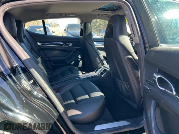 2014 Porsche Panamera z VIN WP0AA2A71EL010339, wystawiony jako Copart lot #53249195 z przebiegiem 94 880 mil mil oraz Czysty tytuł • Clean title. Historia ofert i sprzedaży dostępna na DreamBid. Obrazek 6.
