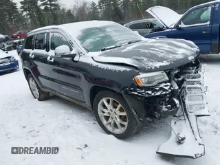 2014 Jeep Grand Cherokee Summit with VIN 1C4RJFJGXEC382112, listed as a IAAI auction lot 41156333 with 154,940 mi miles and . Bid and sale history available at DreamBid. Image 1.