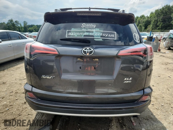 2016 Toyota RAV4 XLE with VIN 2T3RFREV4GW478667, listed as a Copart auction lot 64580095 with 70,593 mi miles and Salvage title. Bid and sale history available at DreamBid. Image 6.