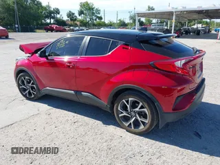 2020 Toyota C-HR LE with VIN JTNKHMBX3L1066720, listed as a IAAI auction lot 42042139 with 98,925 mi miles and . Bid and sale history available at DreamBid. Image 3.