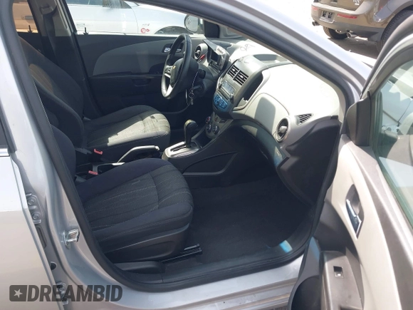2013 Chevrolet Sonic LT with VIN 1G1JC6SG5D4210853, listed as a IAAI auction lot 42078806 with 135,837 mi miles. Bid and sale history available at carsss.com. Image 5.