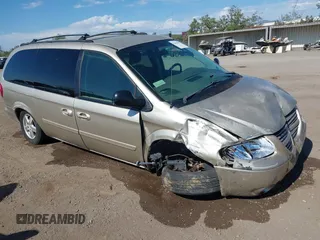 2005 Dodge Caravan SXT z VIN 2D8GP44L05R459369, wystawiony jako IAAI lot #42638057 z przebiegiem 76 777 mil mil oraz . Historia ofert i sprzedaży dostępna na DreamBid. Obrazek 1.