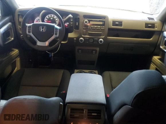 2006 Honda Ridgeline RTS z VIN 2HJYK16456H554437, wystawiony jako Copart lot #56571295 z przebiegiem 127 895 mil mil oraz Szkoda całkowita • Salvage title. Historia ofert i sprzedaży dostępna na DreamBid. Obrazek 8.