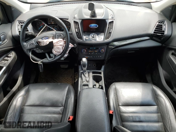 2019 Ford Escape Titanium с VIN 1FMCU9J9XKUA39544, выставлен на аукционе Copart как лот 62363005 с пробегом 80 831 миль миль и Списание • Salvage title. История ставок и продаж доступна на DreamBid. Изображение 8.
