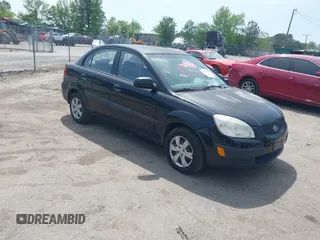 2009 Kia Rio LX with VIN KNADE223496495090, listed as a IAAI auction lot 42154890 with 125,077 mi miles and . Bid and sale history available at DreamBid. Image 1.
