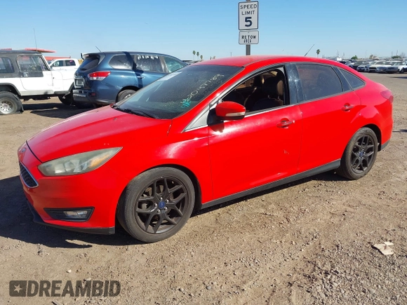 2016 Ford Focus SE with VIN 1FADP3F2XGL256037, listed as a IAAI auction lot 42047789 with 130,274 mi miles. Bid and sale history available at carsss.com. Image 2.