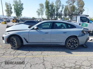 2024 BMW i4 M50 z VIN WBY33AW06RFS45489, wystawiony jako IAAI lot #41981614 z przebiegiem 35 713 mil mil oraz . Historia ofert i sprzedaży dostępna na DreamBid. Obrazek 14.
