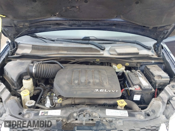 2013 Dodge Grand Caravan SE with VIN 2C4RDGBG4DR567547, listed as a IAAI auction lot 42091862 with 165,827 mi miles and . Bid and sale history available at DreamBid. Image 10.
