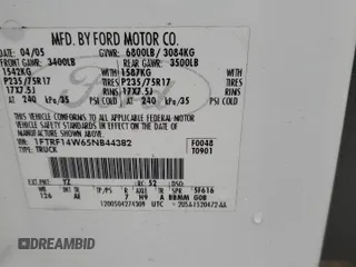 2005 Ford F-150 XL with VIN 1FTRF14W65NB44382, listed as a Copart auction lot 42992825 with 203,839 mi miles and Salvage Title. Bid and sale history available at carsss.com. Image 14.