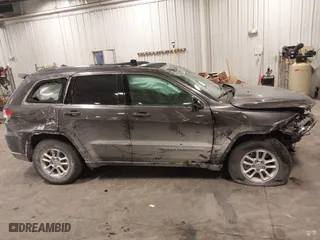 2018 Jeep Grand Cherokee Laredo E with VIN 1C4RJFAG4JC313054, listed as a IAAI auction lot 41469450 with 142,929 mi miles. Bid and sale history available at carsss.com. Image 14.