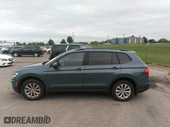 2019 Volkswagen Tiguan S z VIN 3VV1B7AXXKM121963, wystawiony jako IAAI lot #40076115 z przebiegiem 167 540 mil mil oraz . Historia ofert i sprzedaży dostępna na DreamBid. Obrazek 13.