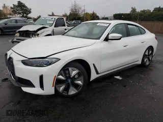 2024 BMW i4 xDrive40 with VIN WBY83FB09RFT27001, listed as a Copart auction lot 82375134 with 690 mi miles and Salvage Title. Bid and sale history available at carsss.com. Image 1.