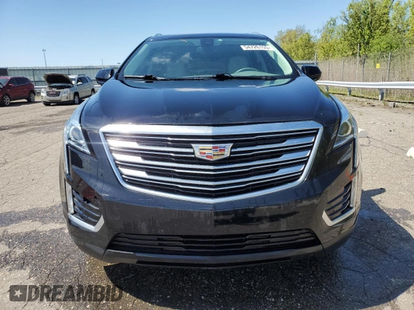 2017 Cadillac XT5 Luxury FWD with VIN 1GYKNBRS1HZ209632, listed as a Copart auction lot 54726155 with 53,924 mi miles and Clean Title. Bid and sale history available at DreamBid. Image 5.