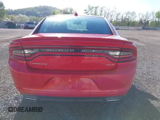 2015 Dodge Charger SXT with VIN 2C3CDXHGXFH858399, listed as a IAAI auction lot 42090958 with 71,488 mi miles and . Bid and sale history available at DreamBid. Image 16.