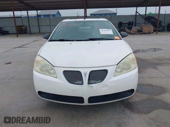 2006 Pontiac G6 GTP z VIN 1G2ZM551X64224909, wystawiony jako IAAI lot #42289564 z przebiegiem 193 418 mil mil oraz . Historia ofert i sprzedaży dostępna na DreamBid. Obrazek 12.