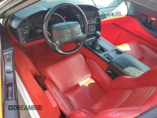 1994 Chevrolet Corvette z VIN 1G1YY22P6R5101716, wystawiony jako Copart lot #70466974 z przebiegiem 75 568 mil mil oraz Szkoda całkowita • Salvage title. Historia ofert i sprzedaży dostępna na DreamBid. Obrazek 8.