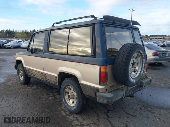 1986 Isuzu Trooper z VIN JACCH55L1G7801560, wystawiony jako IAAI lot #41878592 z przebiegiem 139 020 mil mil oraz . Historia ofert i sprzedaży dostępna na DreamBid. Obrazek 3.
