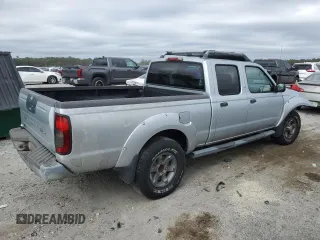 2003 Nissan Frontier SE z VIN 1N6ED29X33C413665, wystawiony jako Copart lot #43689245 z przebiegiem 188 345 mil mil oraz Szkoda całkowita • Salvage title. Historia ofert i sprzedaży dostępna na DreamBid. Obrazek 3.