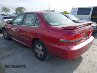 2002 Honda Accord EX z VIN 1HGCG16512A055542, wystawiony jako IAAI lot #42121839 z przebiegiem 196 264 mil mil oraz . Historia ofert i sprzedaży dostępna na DreamBid. Obrazek 3.