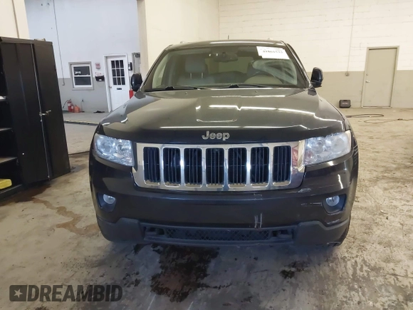2012 Jeep Grand Cherokee Laredo with VIN 1C4RJFAG5CC351539, listed as a IAAI auction lot 41861533 with 166,909 mi miles. Bid and sale history available at carsss.com. Image 12.