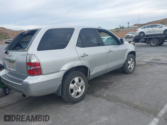2006 Acura MDX with VIN 2HNYD18216H514134, listed as a IAAI auction lot 41233105 with 144,326 mi miles. Bid and sale history available at carsss.com. Image 4.