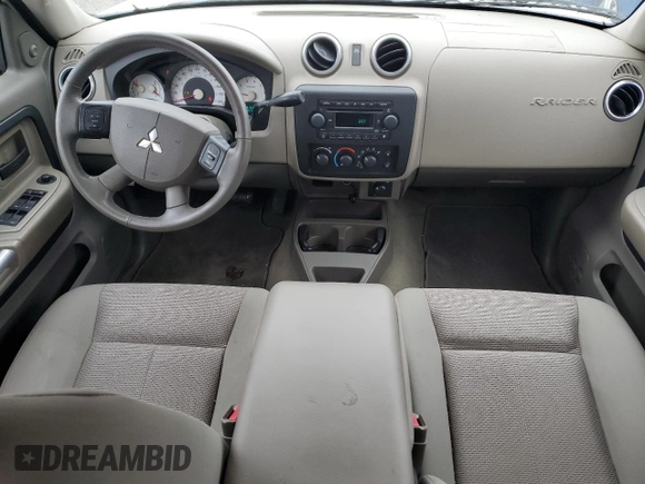 2006 Mitsubishi Raider z VIN 1Z7HT38K16S538273, wystawiony jako Copart lot #79407094 z przebiegiem 67 758 mil mil oraz Szkoda całkowita • Salvage title. Historia ofert i sprzedaży dostępna na DreamBid. Obrazek 8.