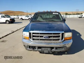 2000 Ford F-350 with VIN 1FTWW32S9YED99031, listed as a Copart auction lot 75952254 with 220,673 mi miles and Salvage title. Bid and sale history available at DreamBid. Image 5.