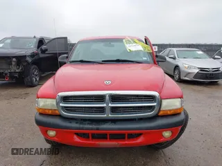 2004 Dodge Dakota Sport with VIN 1D7HL38KX4S657177, listed as a IAAI auction lot 41534575 with 38,802 mi miles. Bid and sale history available at carsss.com. Image 12.