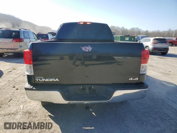 2012 Toyota Tundra z VIN 5TFUM5F1XCX027852, wystawiony jako Copart lot #48555935 z przebiegiem 172 591 mil mil oraz Szkoda całkowita • Salvage title. Historia ofert i sprzedaży dostępna na DreamBid. Obrazek 6.